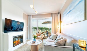 Apartamento conforto (D301) | Área de estar | Smart TV 40 polegadas com canais digitais