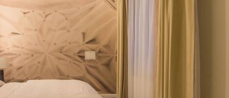 1 غرفة نوم ومكواة/لوح كي وواي فاي وملاءات أسرّة