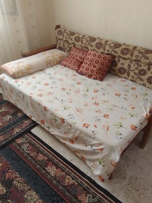 مكواة/لوح كي وملاءات أسرّة