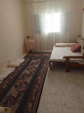 مكواة/لوح كي وملاءات أسرّة