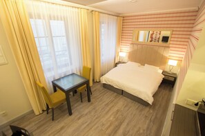 1 habitación, tabla de planchar con plancha, wifi y ropa de cama 