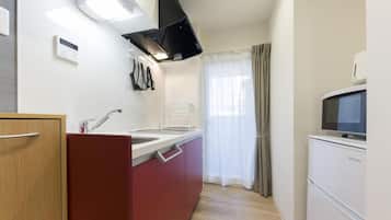 Fridge, microwave, griddle, cookware/dishes/utensils