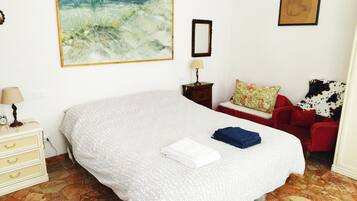 Fer et planche à repasser, draps fournis