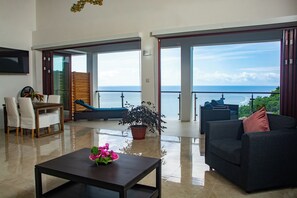 Luxury Apartment, Balcony, Sea View | In-room safe, blackout drapes, soundproofing, iron/ironing board