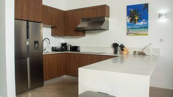 Luxury Apartment, Balcony, Sea View | In-room safe, blackout drapes, soundproofing, iron/ironing board