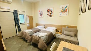 Desk, laptop workspace, blackout drapes, soundproofing