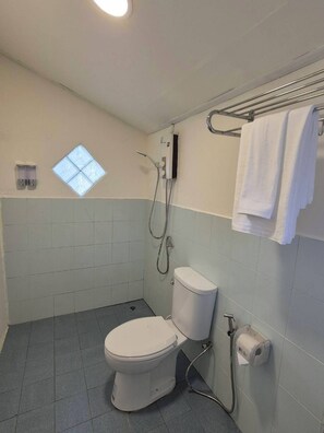Superior Bungalow, Balcony, Pool View | Bathroom | Shower, towels, soap, shampoo