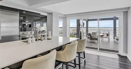 Luxury Oceanfront Mansion With Sea Access, Including a Private Boat and Jet Ski.