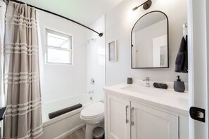 Hair dryer, towels, soap, shampoo - Bright and Cozy/ 3BR Main Floor/ Close to Downtown. (Edmonton)