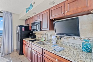 Fridge, microwave, stovetop, coffee/tea maker - Beachfront Condo with Lazy River (North Myrtle Beach)