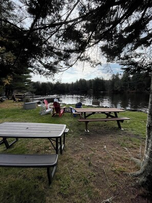 Outdoor dining - Casa Verde: Waterfront 5BR Retreat with 2 Living Areas & Fire Pit! (Old Forge)