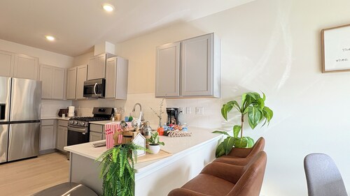 Breakfast Bar + Cozy Living Room + Snacks + Laundry