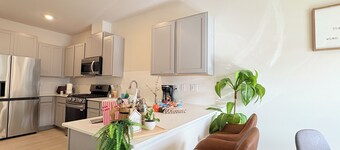 Breakfast Bar + Cozy Living Room + Snacks + Laundry