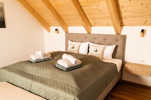 2 chambres, coffres-forts dans les chambres, fer et planche à repasser