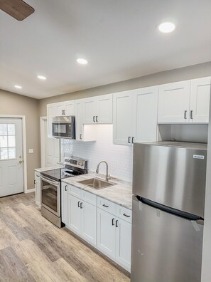 Fridge, microwave, oven, stovetop - Lakeside Lodge- Renovations & upgrades coming! (Hammond)