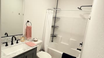 Hair dryer, towels, soap, toilet paper