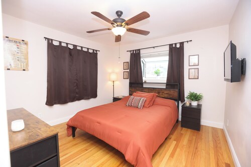 Safe and luxurious home with a garage on quiet street; close to major highways.