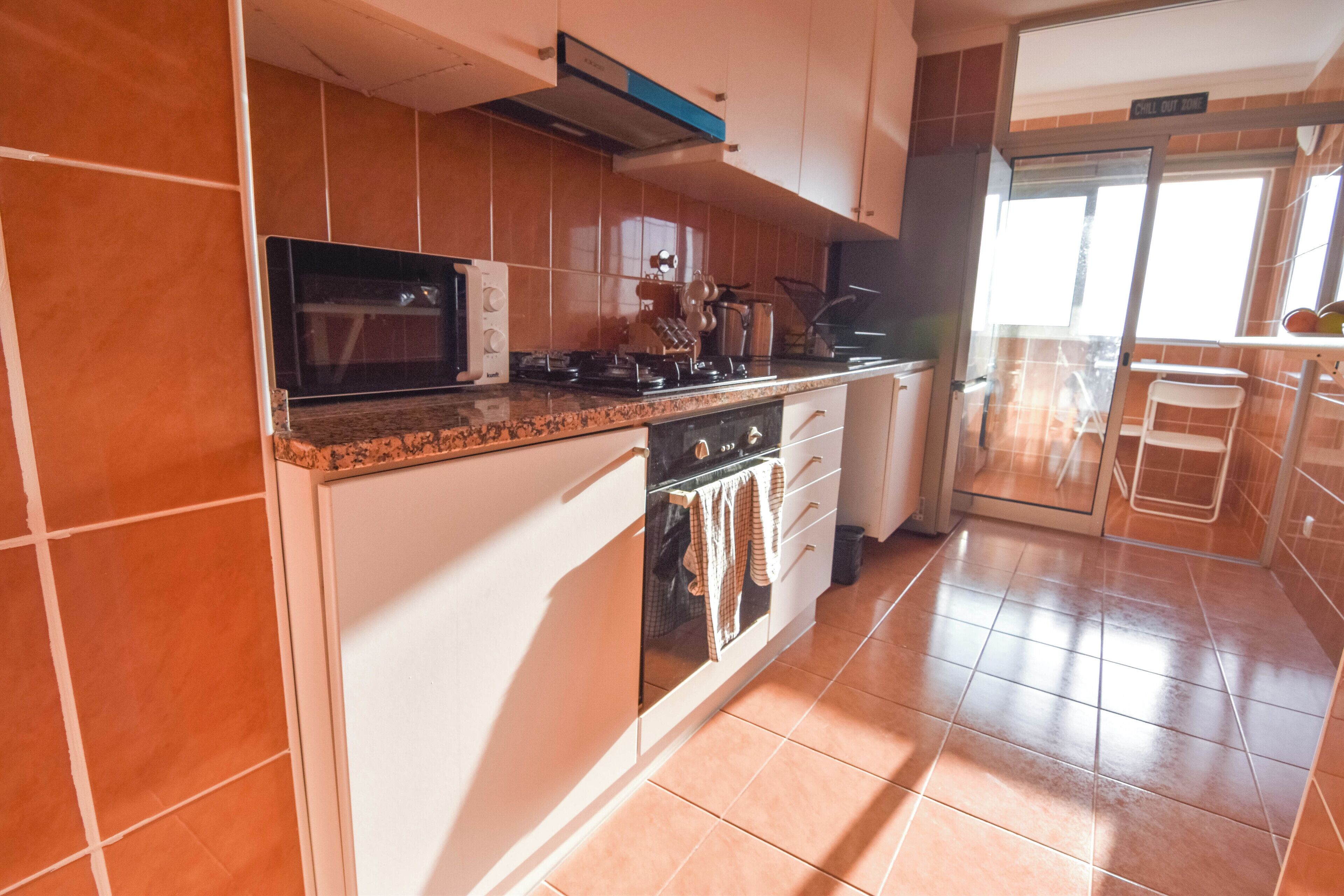 Een magnetron, een oven, een kookplaat