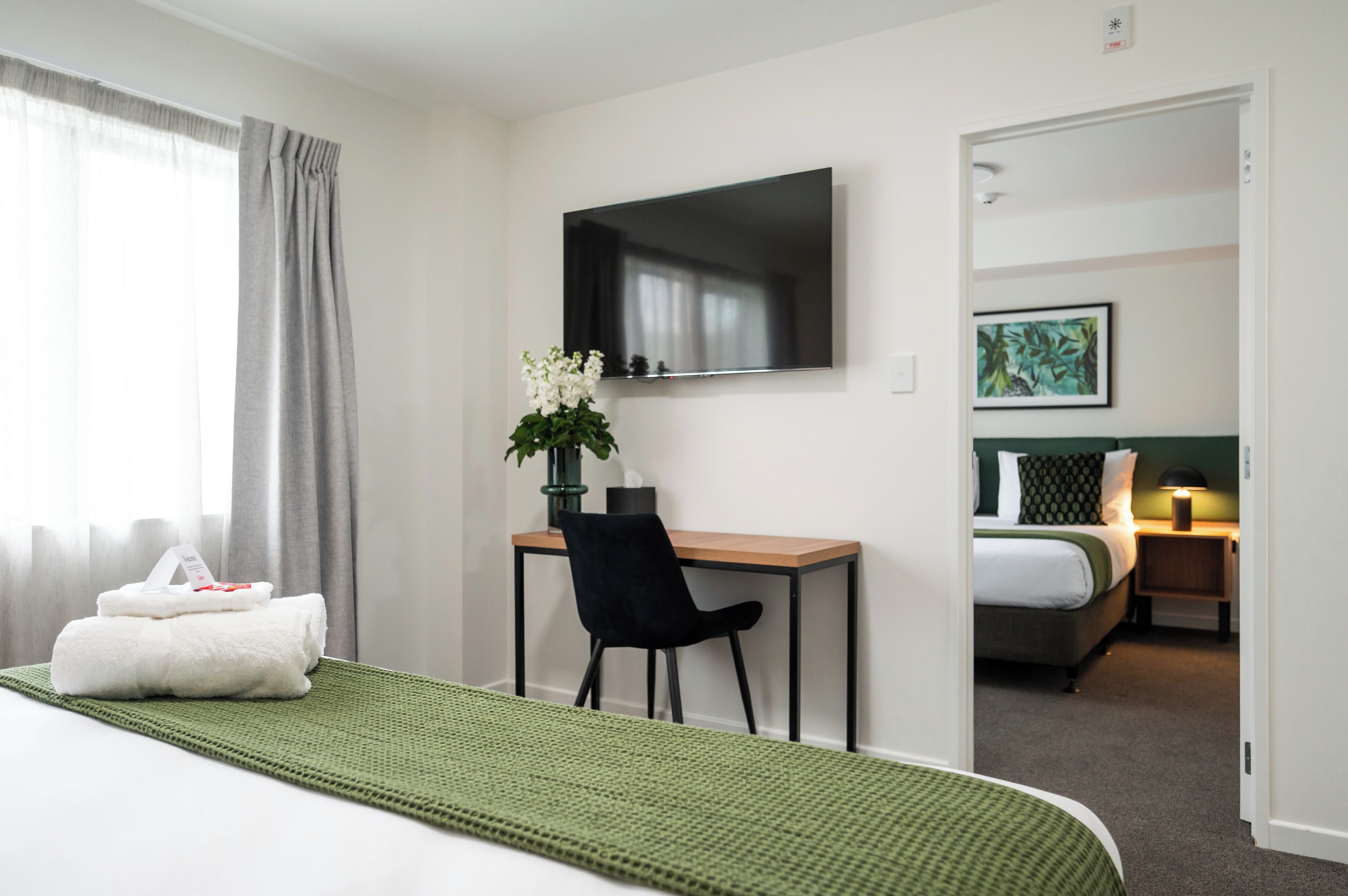 Two Bedroom Apartment | Desk, laptop workspace, blackout curtains, iron/ironing board