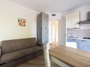 Apartment | Living room - Air-conditioned Apartment With Private Parking (Badesi)