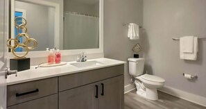 Hair dryer, towels, soap, toilet paper