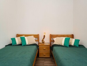 Maison | 1 chambre, fer et planche à repasser