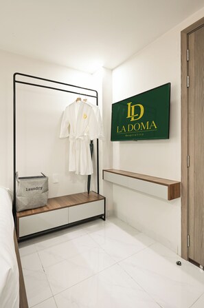 Superior Studio | Living area | 30-inch flat-screen TV with digital channels - Soi by La Doma Express (Quan Bay)