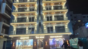 A multi-story hotel named "Hotel Sea Soul" with a reception area and a restaurant. - HOTEL SEA SOUL AYAN GROUP OF HOTEL  (Digha)
