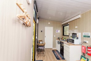 Fridge, microwave, stovetop, coffee/tea maker