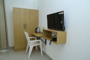 Quarto casal luxo, 1 cama King | Opções para refeição no quarto