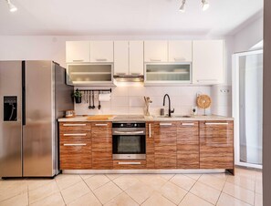 House | Private kitchen | Highchair - Elegant Coastal Retreat in Lukoran (Preko)