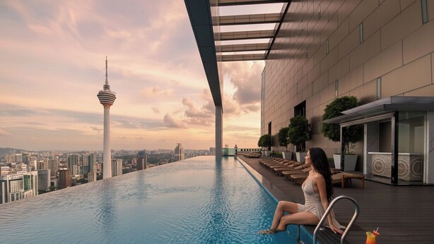 A rooftop infinity pool with a cityscape view, including a tower.