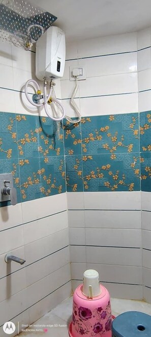 Shower, rainfall showerhead, designer toiletries, towels