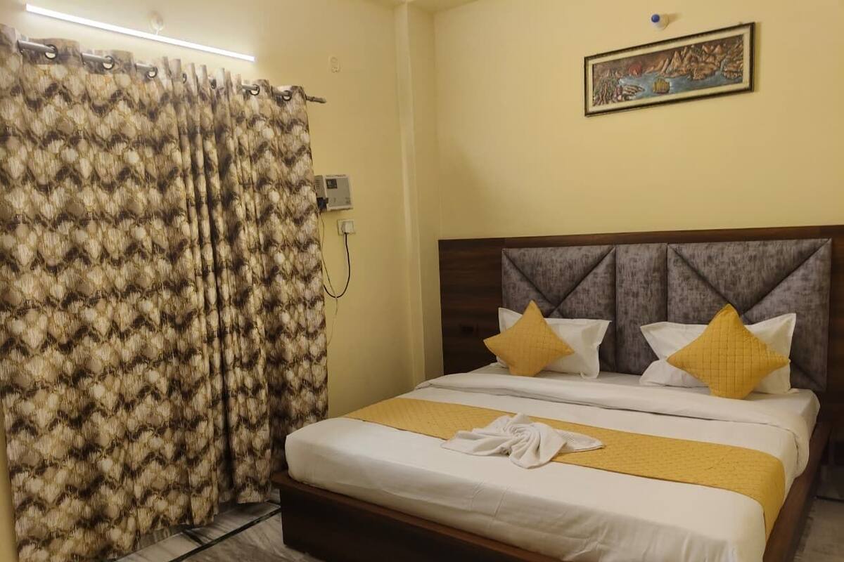 Deluxe Double Room, Balcony, City View | In-room safe, desk, free WiFi
