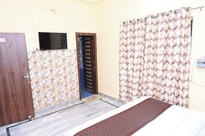 Family Room, Balcony, City View | In-room safe, desk, free WiFi