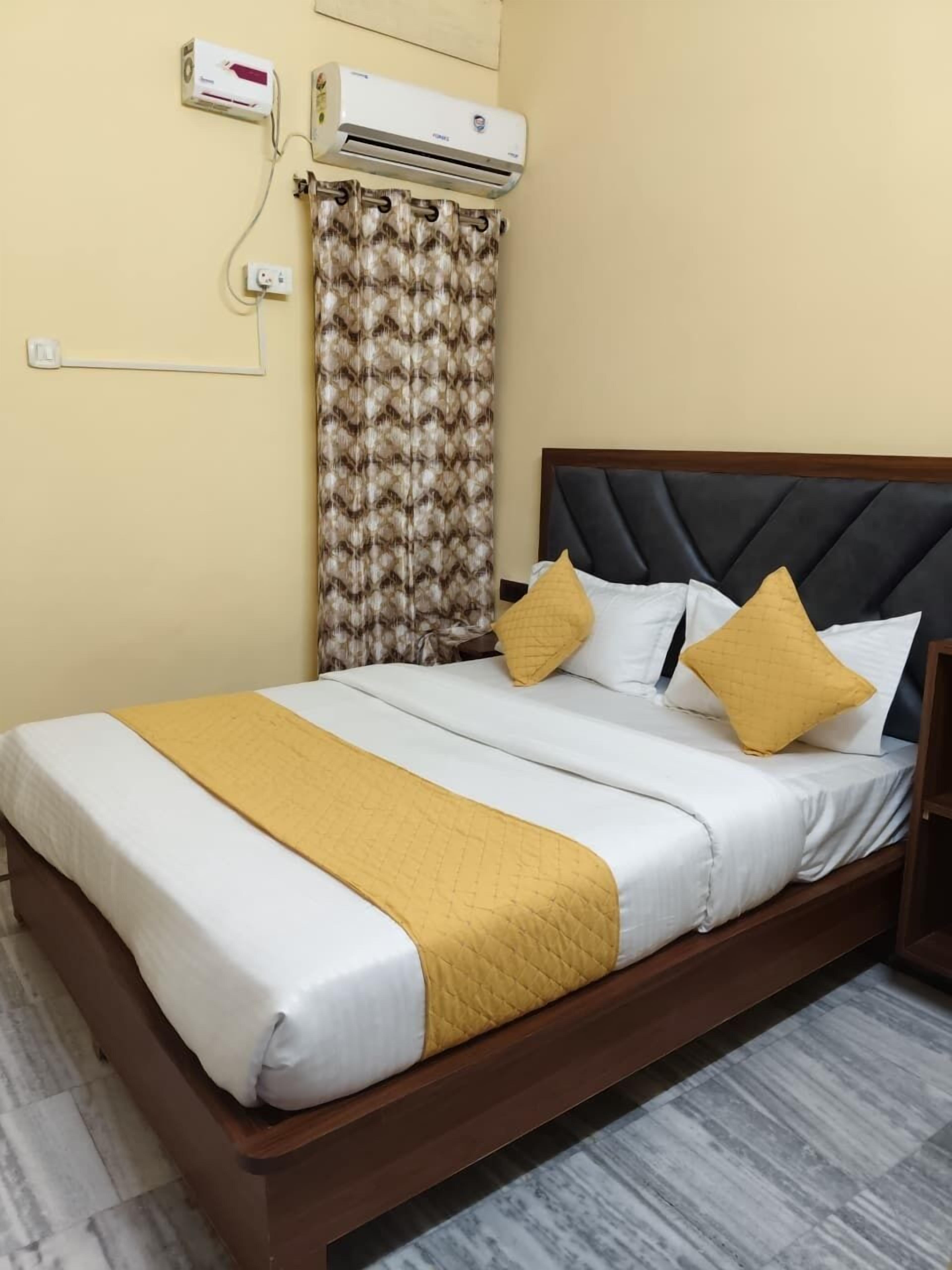 Deluxe Room, Balcony, City View | In-room safe, desk, free WiFi