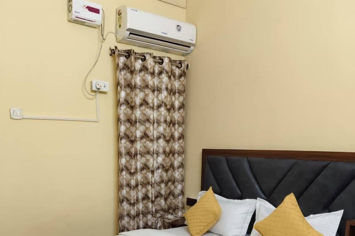 Deluxe Room, Balcony, City View | In-room safe, desk, free WiFi