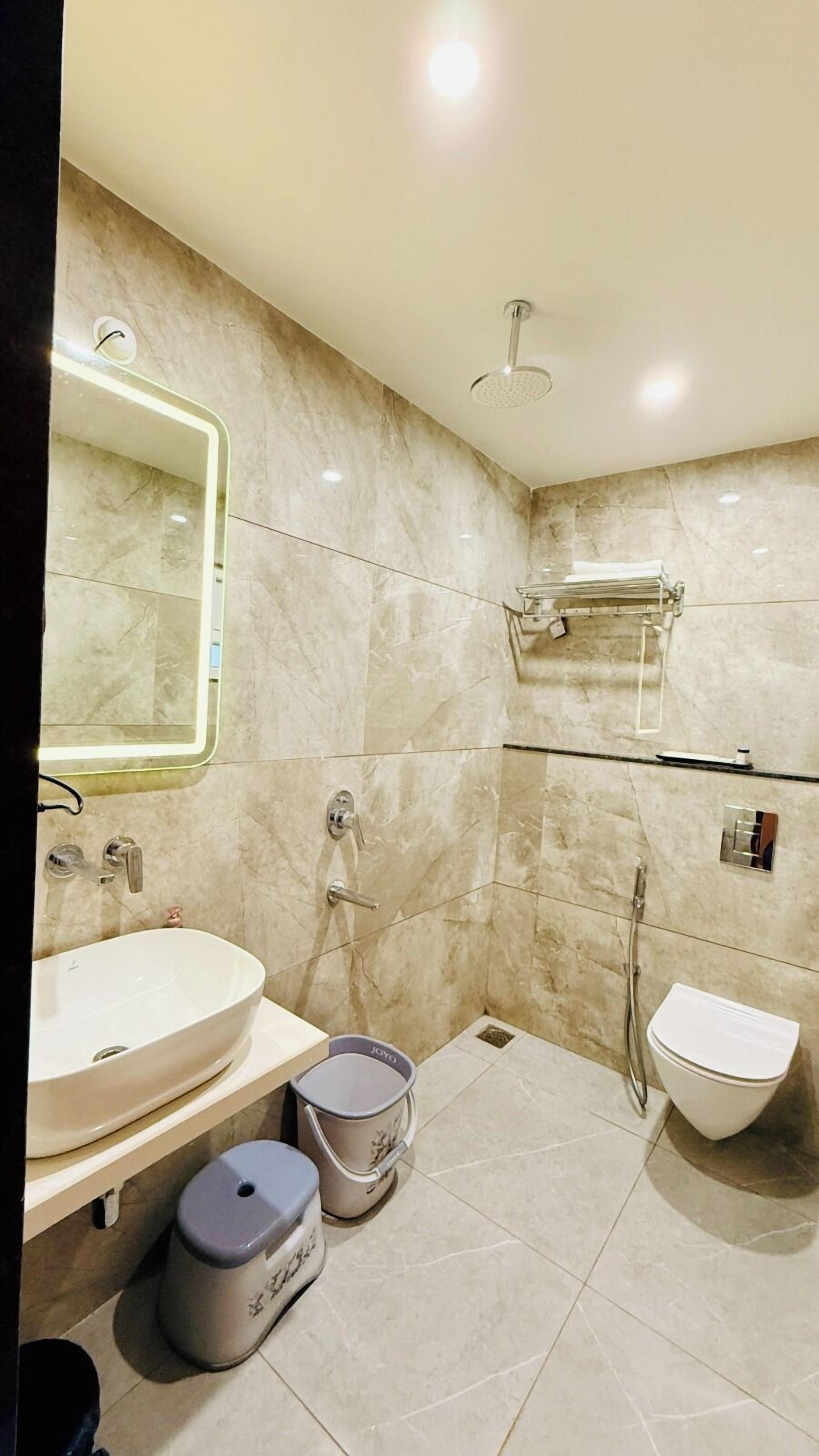 Suite, City View | Bathroom | Shower, towels, soap, shampoo