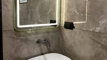 Shower, towels, soap, shampoo