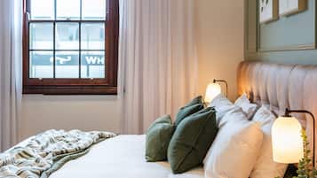 Ropa de cama de alta calidad y tabla de planchar con plancha