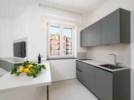Luxury Suite, Balcony, City View | Private kitchen | Espresso maker, coffee/tea maker, electric kettle