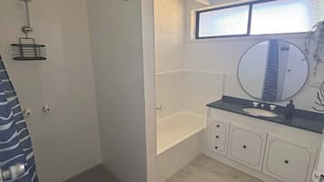 Shower, towels, soap, toilet paper
