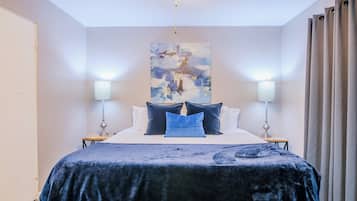 1 bedroom, desk, iron/ironing board, travel crib