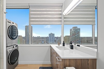 Downtown Luxury High-Rise | City Views & King Bed