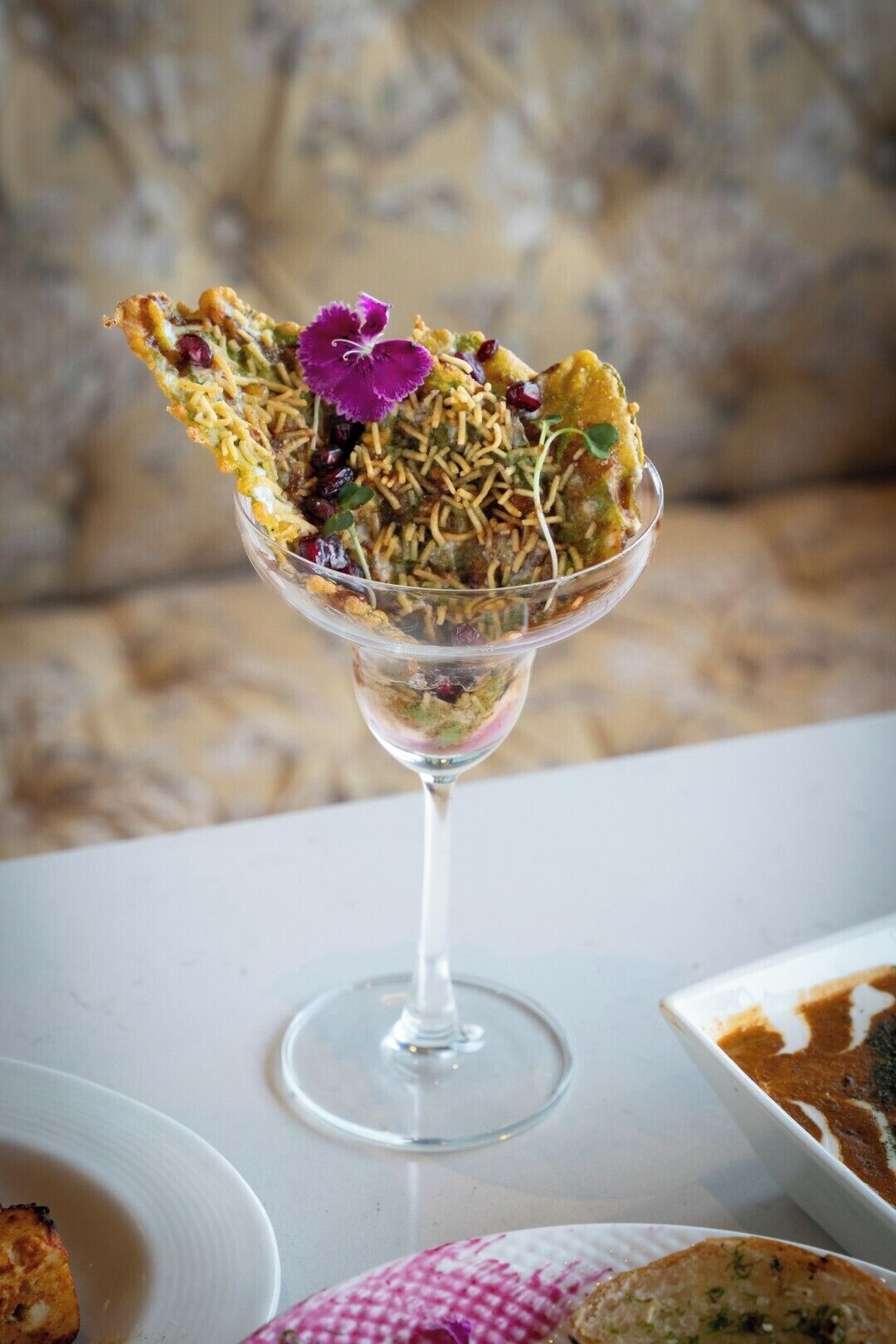 A dessert in a glass bowl on a table.