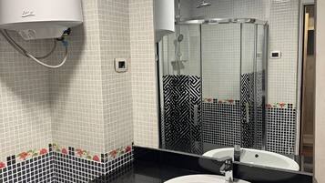 Standard Single Room, City View | Bathroom | Shower, slippers, towels, soap