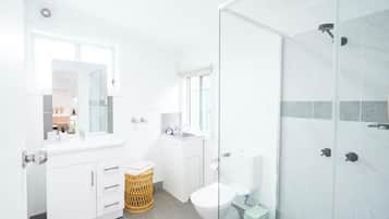 Shower, hair dryer, towels, soap