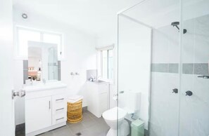 Shower, hair dryer, towels, soap