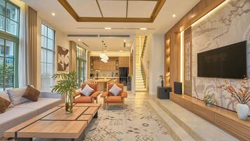 Deluxe villa, 4 slaapkamers, uitzicht op tuin | Woonruimte