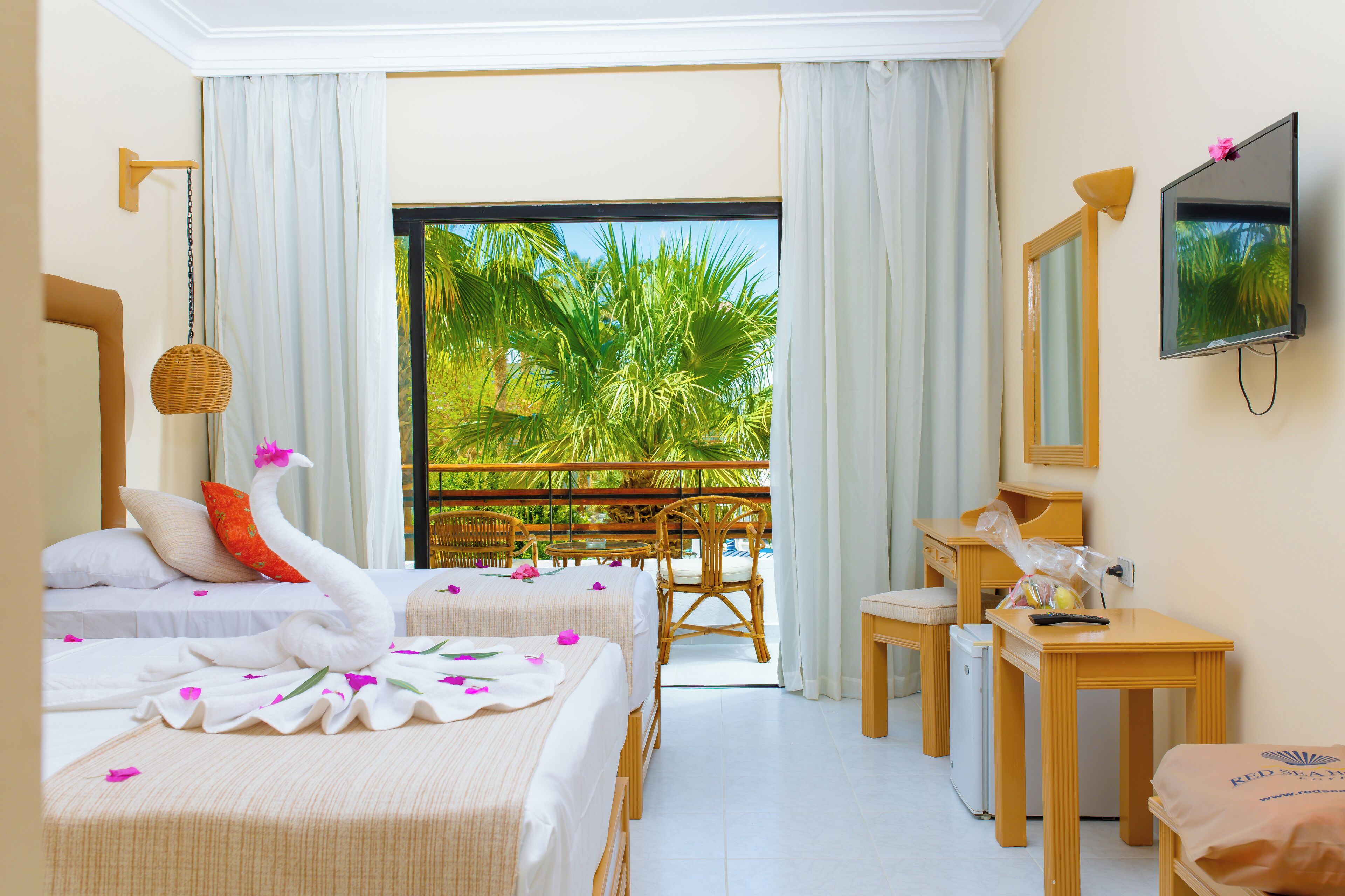 Superior Room | Minibar, in-room safe, desk, iron/ironing board